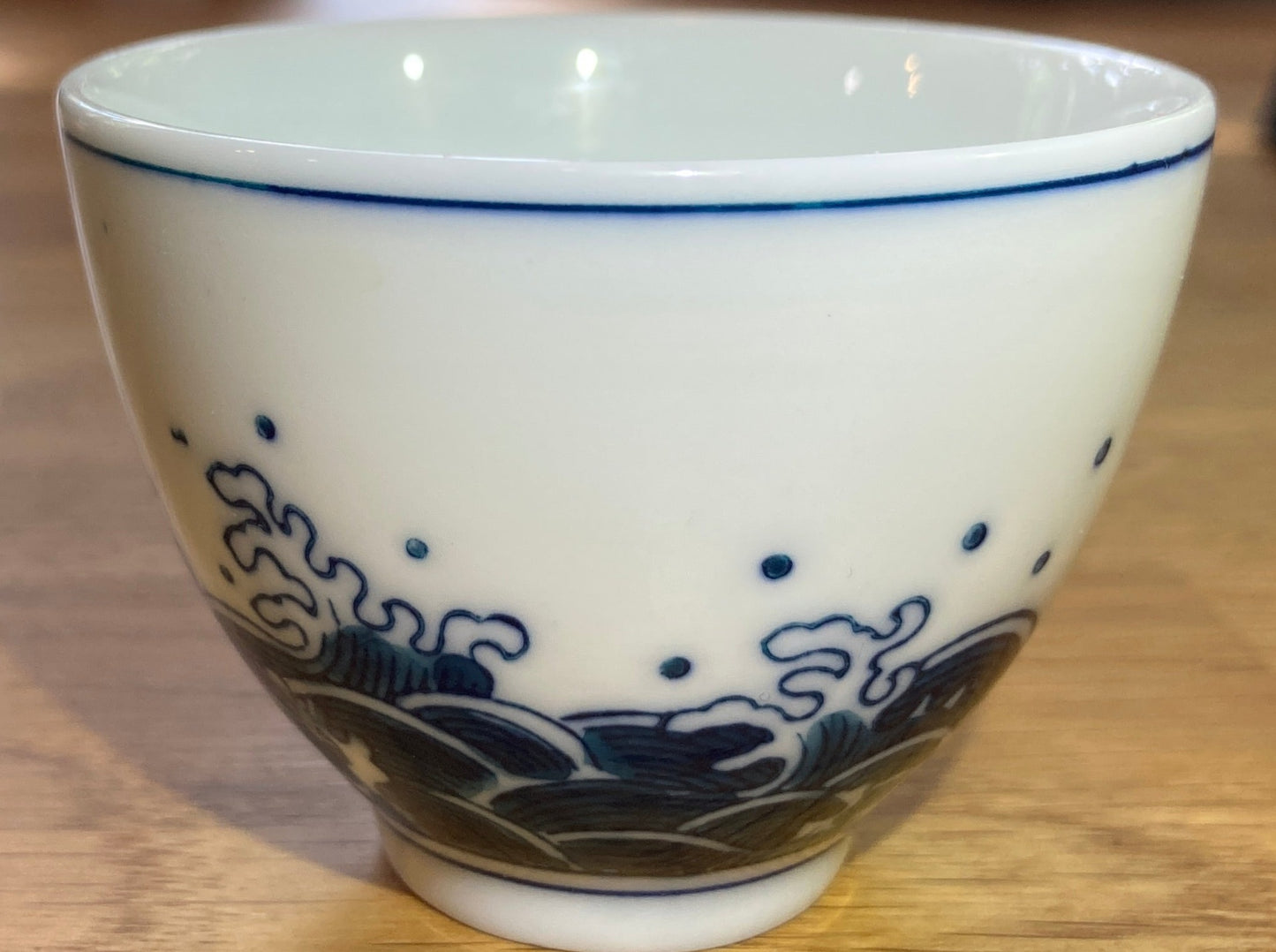 storm and wave tea cup